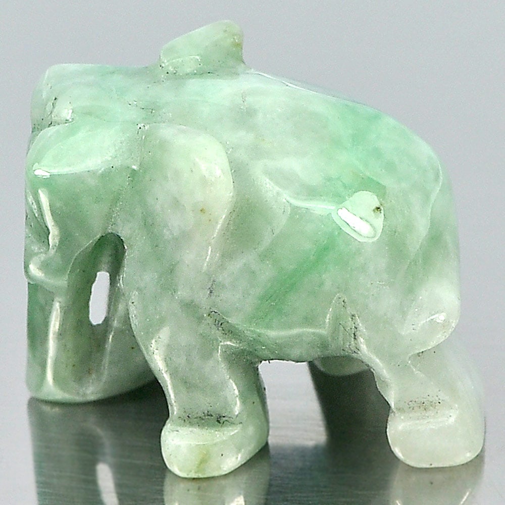 Natural Green White Jade 57.23 Ct. Elephant Carving Shape 24 x 18 Mm Gemstone From Thailand: Product ID: 819812722 Product Name: Natural Jade Weight: 57.23 CT. Size: 24 x 18 x 16 MM. Shape: Elephant Carving Color: Green Clarity:Opaque Luster: Good Gems Origin: Thailand Treatment: Unheated Cry