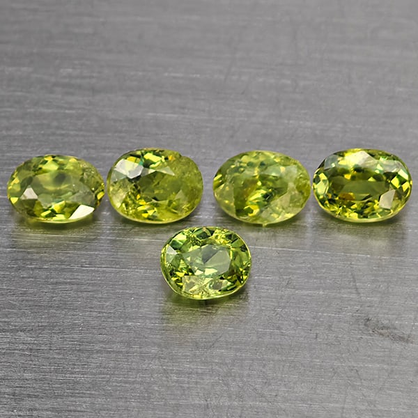 Natural Green Demantiod Garnet 1.25 Ct. 5 Pcs Oval Shape 4.2 x 3.3 Mm Gemstones From Madagascar: Product ID: 802937548 Product Name: Natural Demantoid Weight: 1.25 CT. Size: 4.2 x 3.3 x 2.4 MM. Shape: Oval Color: Green Clarity:SI1 Luster: Good Gems Origin: Madagascar Treatment: Unheated Crystal S