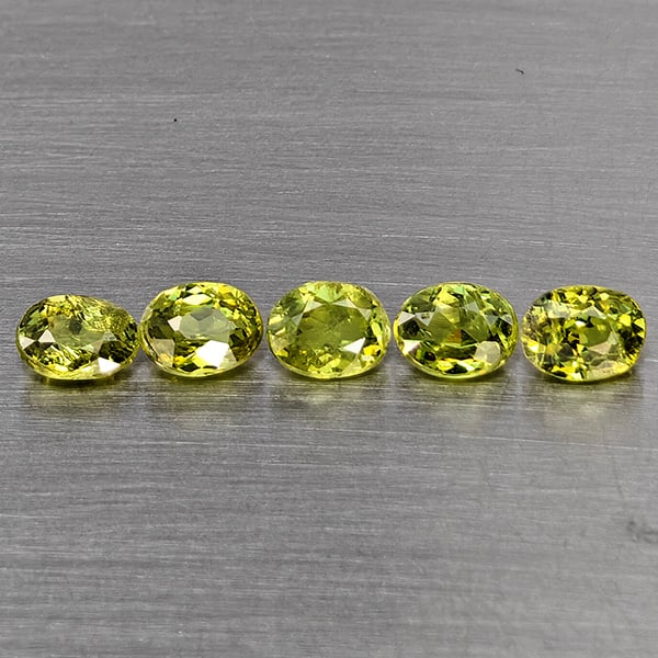 Natural Green Demantiod Garnet 1.27 Ct. 5 Pcs Oval Shape 4 x 3 Mm Gemstones From Madagascar: Product ID: 802937544 Product Name: Natural Demantoid Weight: 1.27 CT. Size: 4 x 3 x 2 MM. Shape: Oval Color: Green Clarity:SI1 Luster: Good Gems Origin: Madagascar Treatment: Unheated Crystal Structu