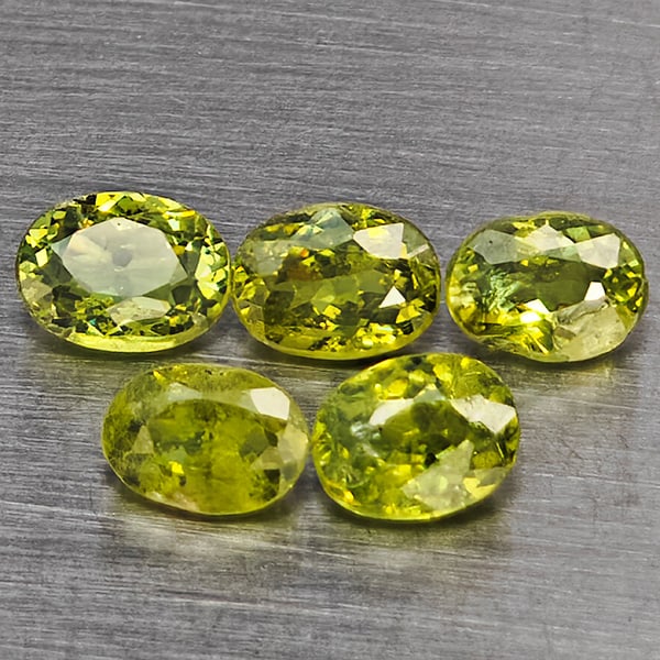 Natural Green Demantiod Garnet 1.34 Ct. 5 Pcs Oval Shape 4.5 x 3.3 Mm Gemstones From Madagascar: Product ID: 802937525 Product Name: Natural Demantoid Weight: 1.34 CT. Size: 4.5 x 3.3 x 2.3 MM. Shape: Oval Color: Green Clarity:SI1 Luster: Good Gems Origin: Madagascar Treatment: Unheated Crystal S