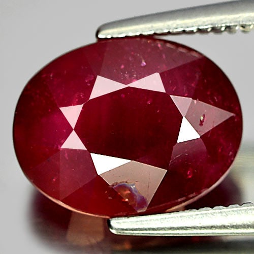 Natural Purplish Red Ruby 3.47 Ct. Oval Shape 9.9 x 7.7 Mm Gemstone From Madagascar: Product ID: 805927434 Product Name: Natural Ruby Weight: 3.47 CT. Size: 9.9 x 7.7 x 4.8 MM. Shape: Oval Color: Purplish Red Clarity:VSI Luster: Good Gems Origin: Madagascar Treatment: Heated (Lead-gla