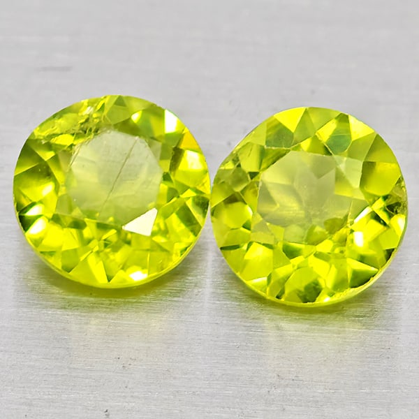 Natural Green Peridot 1.86 Ct. 2 Pcs Round Shape 6 Mm Gemstones from Pakistan: Product ID: 805317440 Product Name: Natural Rhodolite Weight: 1.86 CT. Size: 6 x 6 x 3.7 MM. Shape: Round Color: Green Clarity:VSI Luster: Good Gems Origin: Pakistan Treatment: Unheated Crystal Struct