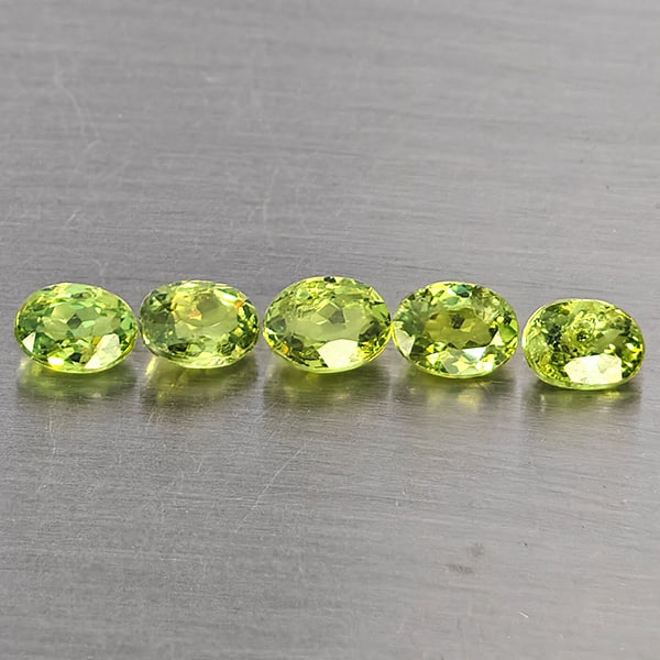 Natural Green Demantiod Garnet 1.22 Ct. 5 Pcs Oval Shape 4.2 x 3.2 Mm Gemstones From Madagascar: Product ID: 802937512 Product Name: Natural Demantoid Weight: 1.22 CT. Size: 4.2 x 3.2 x 2.1 MM. Shape: Oval Color: Green Clarity:SI1 Luster: Good Gems Origin: Madagascar Treatment: Unheated Crystal S