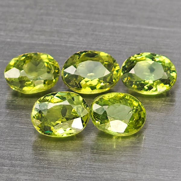 Natural Green Demantiod Garnet 1.02 Ct. 5 Pcs Oval Shape 4 x 3 Mm Gemstones From Madagascar: Product ID: 802937520 Product Name: Natural Demantoid Weight: 1.02 CT. Size: 4 x 3 x 2 MM. Shape: Oval Color: Green Clarity:SI1 Luster: Good Gems Origin: Madagascar Treatment: Unheated Crystal Structu