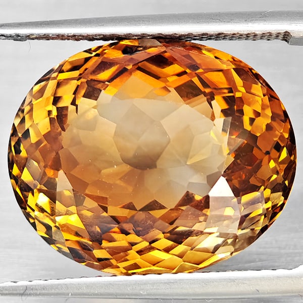 Natural Imperial Topaz 18.32 Ct. Oval Shape 16.4 x 13.6 Mm Gemstone From Brazil: Product ID: 807168583 Product Name: Natural Topaz Weight: 18.32 CT. Size: 16.4 x 13.6 x 10 MM. Shape: Oval Shape Color: Imperial Clarity:VSI Luster: Good Gems Origin: Brazil Treatment: Treated Crystal