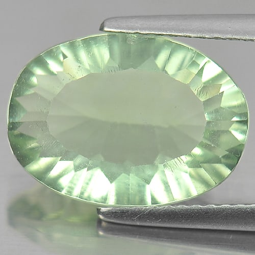 Natural Green Fluorite 6.24 Ct. Oval Concave Cut 14.2 x 10.3 Mm Gemstone From Brazil: Product ID: 802704484 Product Name: Natural Fluorite Weight: 6.24 CT. Size: 14.2 x 10.3 x 6.1 MM. Shape: Oval Concave Cut Color: Green Clarity:VVS Luster: Good Gems Origin: Brazil Treatment: Unheated 