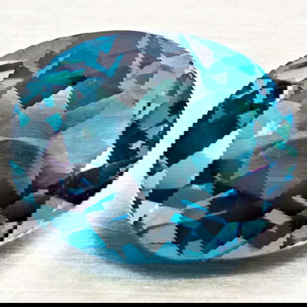 Natural London Blue Topaz 3.55 Ct. Oval Shape 10.2 x 8.4 Mm Gemstone From Brazil: Product ID: 807168426 Product Name: Natural Blue Topaz Weight: 3.55 CT. Size: 10.2 x 8.4 x 5.3 MM. Shape: Oval Color: London Blue Clarity:VVS - VSI Luster: Very Good Gems Origin: Brazil Treatment: Tre