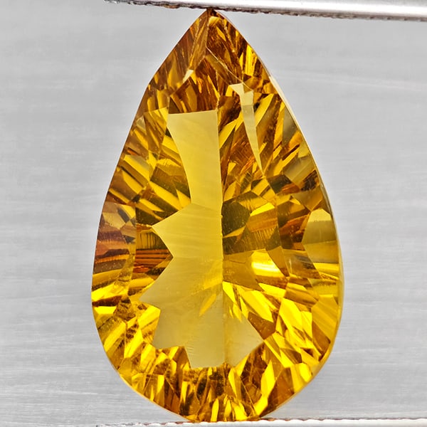 Natural Yellow Citrine 12.40 Ct. Clean Pear Concave Cut 20 x 13 Mm Gemstone From Brazil: Product ID: 801815400 Product Name: Natural Citrine Weight: 12.40 CT. Size: 20 x 13 x 9 MM. Shape: Pear Concave Cut Color: Yellow Clarity:VSI Luster: Good Gems Origin: Brazil Treatment: Unheated Cryst