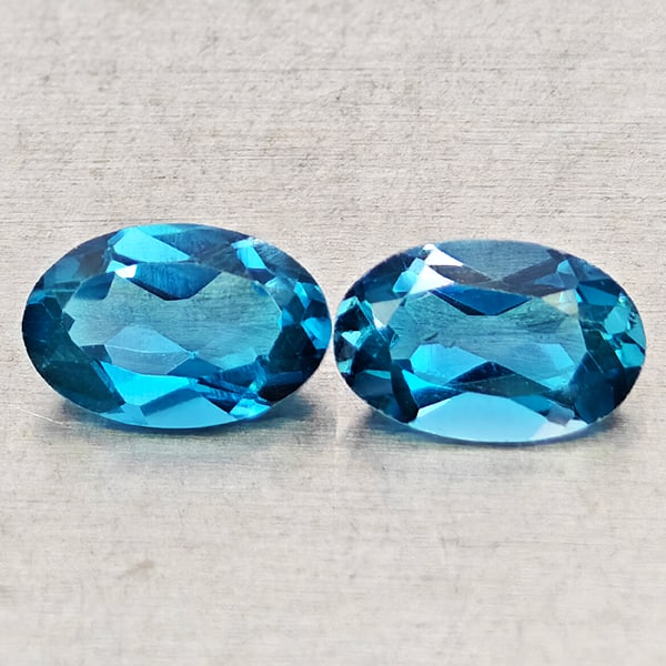Natural London Blue Topaz 1.06 Ct. 2 Pcs Oval Shape 6 x 4 Mm Gemstones From Brazil: Product ID: 807168440 Product Name: Natural Blue Topaz Weight: 1.06 CT. Size: 6 x 4 x 2.8 MM. Shape: Oval Shape Color: London Blue Clarity:VSI - SI1 Luster: Good Gems Origin: Brazil Treatment: Treated