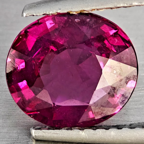 Natural Purplish Red Rhodolite Garnet 2.53 Ct. Oval Shape 9.1 x 8.1 Mm Gemstone From Madagascar: Product ID: 802937793 Product Name: Natural Rhodolite Weight: 2.53 CT. Size: 9.1 x 8.1 x 4.3 MM. Shape: Oval Shape Color: Purplish Red Clarity:SI1 Luster: Good Gems Origin: Madagascar Treatment: Unhea