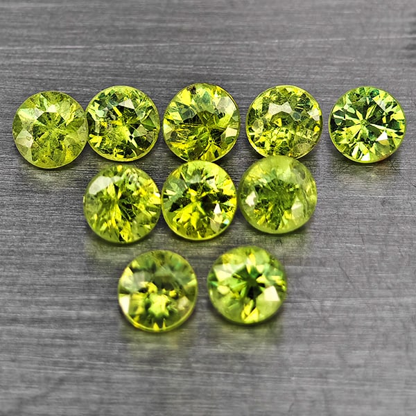 Natural Green Demantiod Garnet 0.59 Ct. 10 Pcs Round Diamond Cut 2.2 Mm Gemstones From Madagascar: Product ID: 802937434 Product Name: Natural Demantoid Weight: 0.59 CT. Size: 2.2 x 2.2 x 1.4 MM. Shape: Round Diamond Cut Color: Green Clarity:SI1 Luster: Good Gems Origin: Madagascar Treatment: Unhea