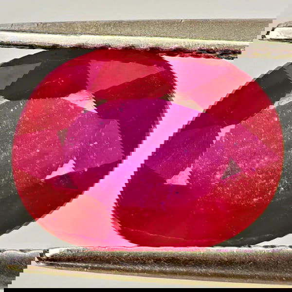 Natural Purplish Red Ruby 2.73 Ct. Oval Shape 9.2 x 7 Mm Gemstone From Madagascar: Product ID: 805935544 Product Name: Natural Ruby Weight: 2.73 CT. Size: 9.2 x 7 x 4.5 MM. Shape: Oval Color: Purplish Red Clarity:VSI Luster: Good Gems Origin: Madagascar Treatment: Heated (Lead-glass