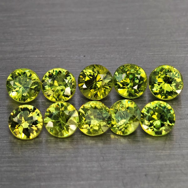 Natural Green Demantiod Garnet 0.69 Ct. 10 Pcs Round Diamond Cut 2.5 Mm Gemstones From Madagascar: Product ID: 802937433 Product Name: Natural Demantoid Weight: 0.69 CT. Size: 2.5 x 2.5 x 1.8 MM. Shape: Round Diamond Cut Color: Green Clarity:SI1 Luster: Good Gems Origin: Madagascar Treatment: Unhea