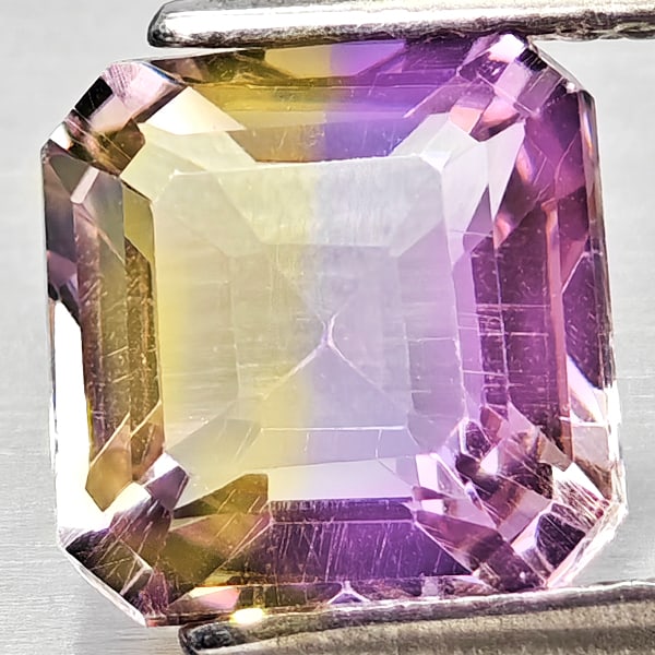 Natural Bi Color Ametrine 2.04 Ct. Octagon Shape 7.7 x 7.7 Mm Gemstone From Bolivia: Product ID: 800408324 Product Name: Natural Ametrine Weight: 2.04 CT. Size: 7.7 x 7.7 x 4.9 MM. Shape: Octagon Color: Bi Color Clarity:VSI Luster: Good Gems Origin: Bolivia Treatment: Unheated Crystal