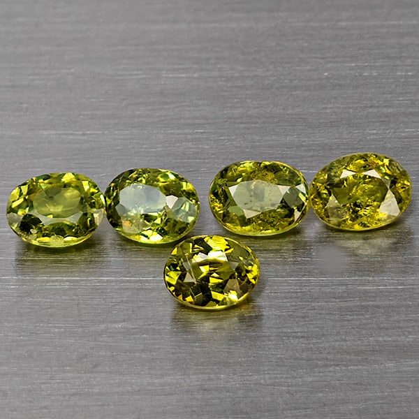 Natural Green Demantiod Garnet 1.23 Ct. 5 Pcs Oval Shape 4 x 3.2 Mm Gemstones From Madagascar: Product ID: 802937466 Product Name: Natural Demantoid Weight: 1.23 CT. Size: 4 x 3.2 x 2.5 MM. Shape: Oval Shape Color: Green Clarity:SI1 Luster: Good Gems Origin: Madagascar Treatment: Unheated Cryst