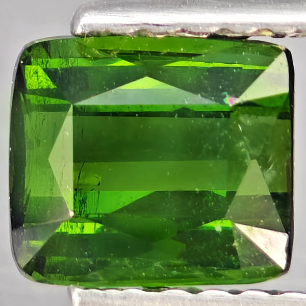 Natural Green Tourmaline 1.06 Ct. Octagon Shape 6.2 x 5.4 Mm Gemstone From Nigeria: Product ID: 807251150 Product Name: Natural Tourmaline Weight: 1.06 CT. Size: 6.2 x 5.4 x 3.7 MM. Shape: Octagon Color: Green Clarity:SI1 Luster: Good Gems Origin: Nigeria Treatment: Unheated Crystal 