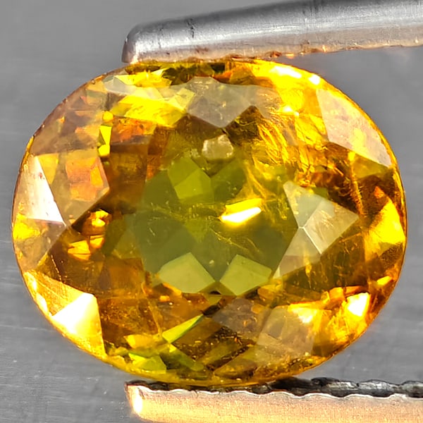 Natural Multi-Color Sphene With Rainbow Spark 1.76 Ct. Oval Shape 8.5 x 7.2 Mm Gemstone From: Product ID: 806509118 Product Name: Natural Sphene Weight: 1.76 CT. Size: 8.5 x 7.2 x 4 MM. Shape: Oval Shape Color: Multi-Color Clarity:SI1 Luster: Good Gems Origin: Madagascar Treatment: Unheated Cr