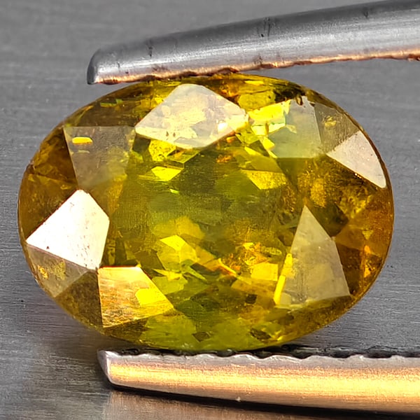 Natural Multi-Color Sphene With Rainbow Spark 1.79 Ct. Oval Shape 8.4 x 6.3 Mm Gemstone From: Product ID: 806509113 Product Name: Natural Sphene Weight: 1.79 CT. Size: 8.4 x 6.3 x 4.6 MM. Shape: Oval Shape Color: Multi-Color Clarity:SI1 Luster: Good Gems Origin: Madagascar Treatment: Unheated 