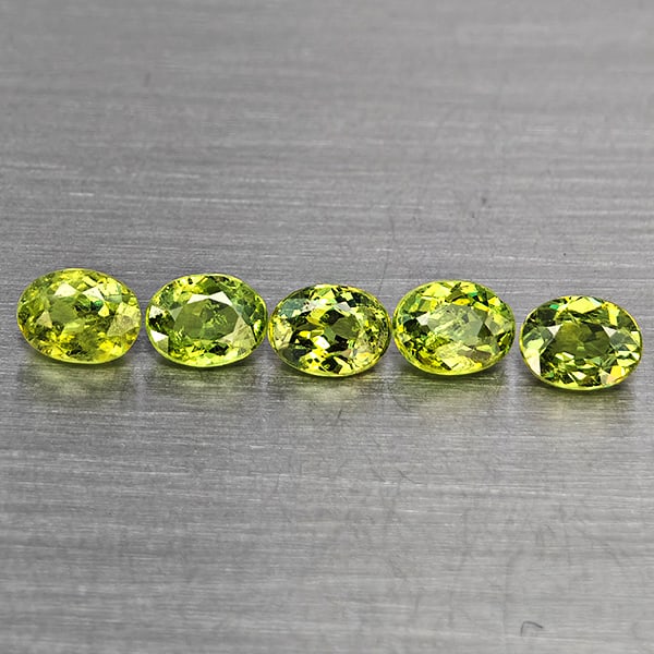 Natural Green Demantiod Garnet 1.08 Ct. 5 Pcs Oval Shape 4.1 x 3.2 Mm Gemstones From Madagascar: Product ID: 802937606 Product Name: Natural Demantoid Weight: 1.08 CT. Size: 4.1 x 3.2 x 1.8 MM. Shape: Oval Shape Color: Green Clarity:VSI Luster: Good Gems Origin: Madagascar Treatment: Unheated Cry