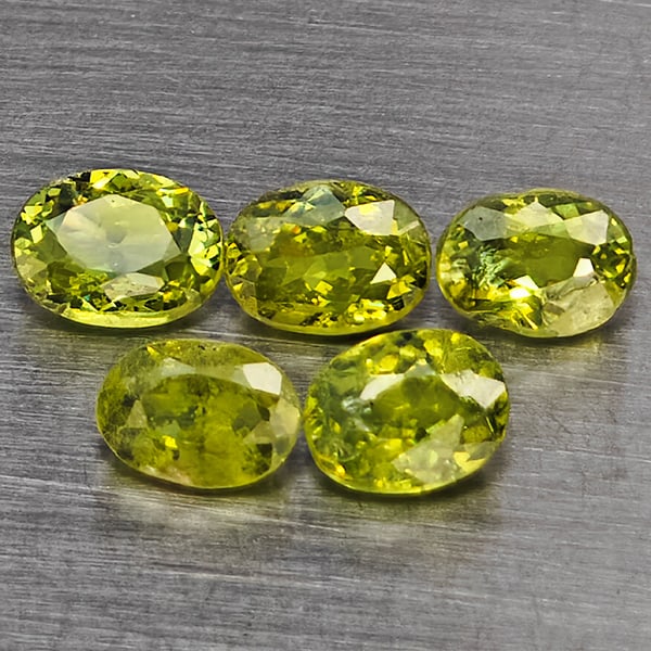 Natural Green Demantiod Garnet 1.08 Ct. 5 Pcs Oval Shape 4 x 3 Mm Gemstones From Madagascar: Product ID: 802937611 Product Name: Natural Demantoid Weight: 1.08 CT. Size: 4 x 3 x 2 MM. Shape: Oval Shape Color: Green Clarity:SI1 Luster: Good Gems Origin: Madagascar Treatment: Unheated Crystal S