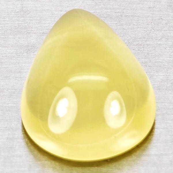 Natural Yellow Lemon Quartz 3.71 Ct. Pear Cabochon Shape 12 x 9 Mm Gemstone From Brazil: Product ID: 805530066 Product Name: Natural Quartz Weight: 3.71 CT. Size: 12 x 9 x 5.6 MM. Shape: Pear Cabochon Color: Yellow Clarity:None Luster: Good Gems Origin: Brazil Treatment: Unheated Crystal