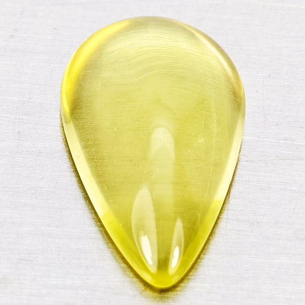 Natural Yellow Lemon Quartz 3.52 Ct. Pear Cabochon Shape 14.8 x 8.2 Mm Gemstone From Brazil: Product ID: 805530062 Product Name: Natural Quartz Weight: 3.52 CT. Size: 14.8 x 8.2 x 4.7 MM. Shape: Pear Cabochon Color: Yellow Clarity:None Luster: Good Gems Origin: Brazil Treatment: Unheated Crys