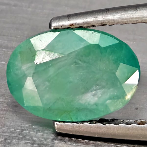 Natural Green Blueish Grandidierite 1.79 Ct. Oval Shape 9.6 x 6.8 Mm Gemstone from Madagascar: Product ID: 803100062 Product Name: Natural Tsavorite Weight: 1.79 CT. Size: 9.6 x 6.8 x 4 MM. Shape: Oval Shape Color: Green Blueish Clarity:SI1 Luster: Good Gems Origin: Madagascar Treatment: Unheat