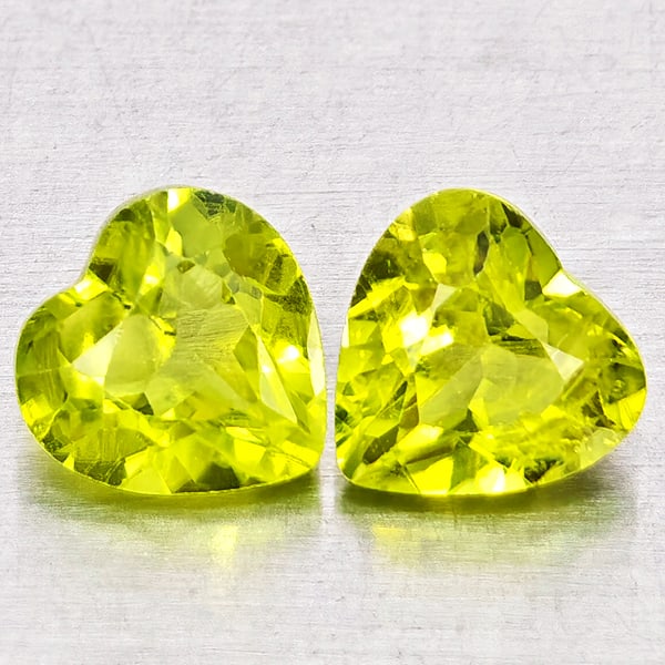 Natural Green Peridot 1.86 Ct. 2 Pcs Heart Shape 6 x 5.9 Mm. Gemstones from Pakistan: Product ID: 805317278 Product Name: Natural Peridot Weight: 1.86 CT. Size: 6 x 5.9 x 4 MM. Shape: Heart Shape Color: Green Clarity:VSI - SI1 Luster: Good Gems Origin: Pakistan Treatment: Unheated Crys