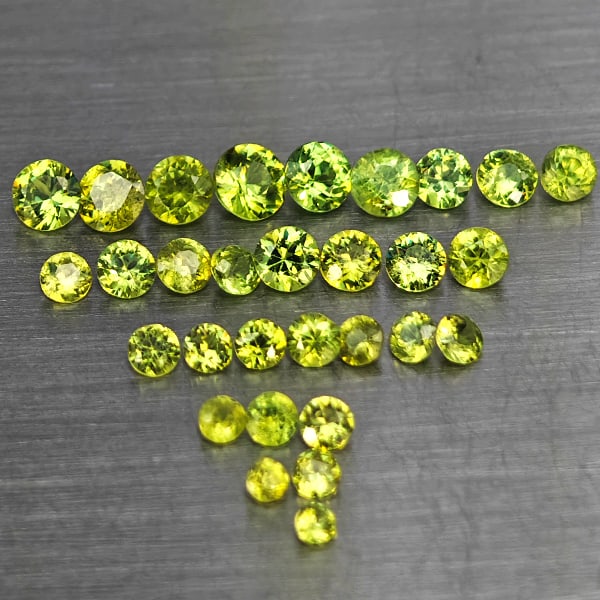 Natural Green Demantiod Garnet 1.51 Ct. 30 Pcs Round Diamond Cut Gemstones From Madagascar: Product ID: 802937424 Product Name: Natural Demantoid Weight: 1.51 CT. Size: 1.8 x 1.8 x 1.1 to 3 x 3 x 2 MM. Shape: Round Diamond Cut Color: Green Clarity:SI1 Luster: Good Gems Origin: Madagascar Tre
