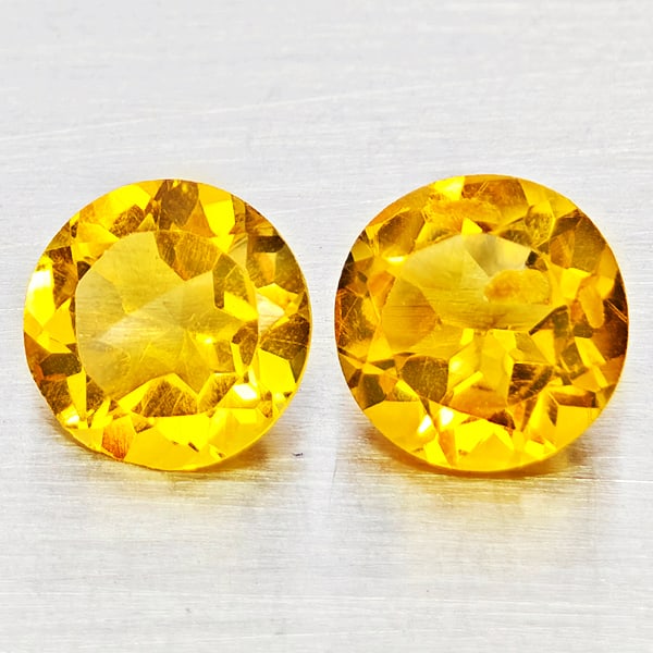 Natural Yellow Citrine 2.18 Ct. 2 Pcs. Round Shape 7.2 Mm. Gemstones From Brazil: Product ID: 801815360 Product Name: Natural Citrine Weight: 2.18 CT. Size: 7.2 x 7.2 x 4.6 MM. Shape: Round Shape Color: Yellow Clarity:VSI - SI1 Luster: Good Gems Origin: Brazil Treatment: Unheated C