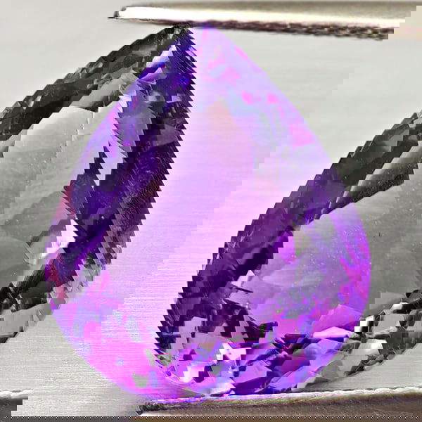 Natural Purple Amethyst 8.81 Ct. Pear Shape 14.7 x 12.5 Mm Gemstone From Brazil: Product ID: 800325447 Product Name: Natural Ametrine Weight: 8.81 CT. Size: 14.7 x 12.5 x 8.6 MM. Shape: Pear Shape Color: Purple Clarity:VSI Luster: Good Gems Origin: Brazil Treatment: Unheated Cryst