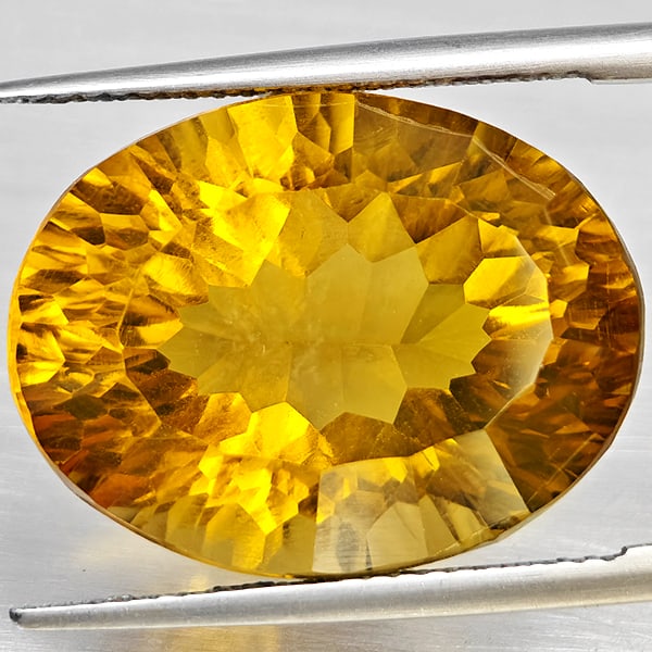 Natural Yellow Citrine 17.03 Ct. Clean Oval Concave Cut 19.4 x 14.8 Mm Gemstone From Brazil: Product ID: 801815420 Product Name: Natural Citrine Weight: 17.03 CT. Size: 19.4 x 14.8 x 10.6 MM. Shape: Oval Concave Color: Yellow Clarity:VSI Luster: Good Gems Origin: Brazil Treatment: Unheated Cr