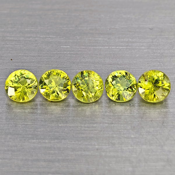 Natural Green Demantiod Garnet 0.97 Ct. 5 Pcs Round Diamond Cut 3.3 Mm Gemstones From Madagascar: Product ID: 802937629 Product Name: Natural Demantoid Weight: 0.97 CT. Size: 3.3 x 3.3 x 2.5 MM. Shape: Round Diamond Cut Color: Green Clarity:SI1 Luster: Good Gems Origin: Madagascar Treatment: Unhea