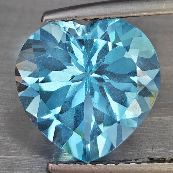 Natural Baby Blue Topaz 4.75 Ct. Heart Shape 11 Mm Gemstone From Brazil: Product ID: 807168728 Product Name: Natural Blue Topaz Weight: 4.75 CT. Size: 11 x 11 x 6.5 MM. Shape: Heart Shape Color: Baby Blue Clarity:VSI Luster: Good Gems Origin: Brazil Treatment: Treated Crys