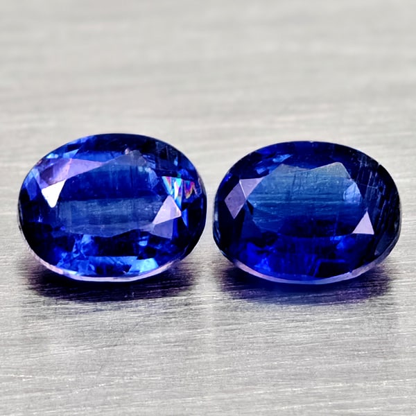 Natural Blue Kyanite 1.11 Ct. 2 Pcs Oval Shape 5.2 x 4.1 Gemstones From Sri - Lanka: Product ID: 804204815 Product Name: Natural Kyanite Weight: 1.11 CT. Size: 5.2 x 4.1 x 2.7 MM. Shape: Oval Color: Blue Clarity:VSI - SI1 Luster: Good Gems Origin: Sri - Lanka Treatment: Unheated Cryst