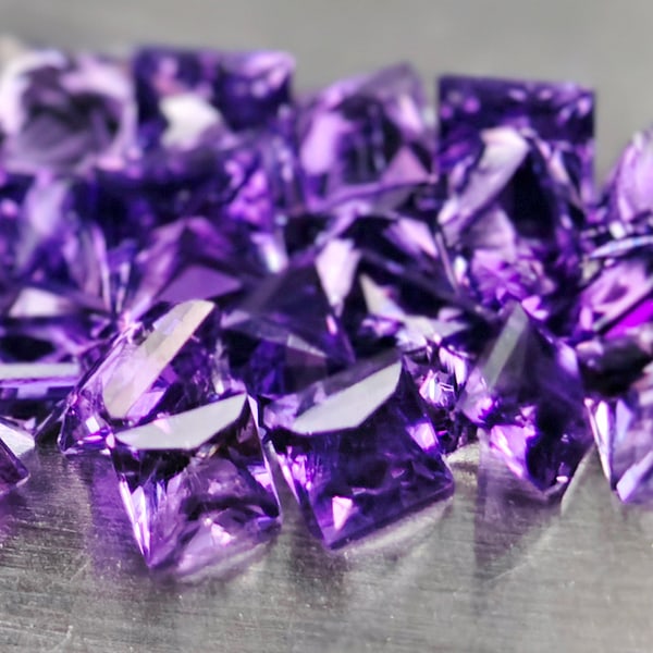 Natural Purple Amethyst 2.91 Ct. 50 Pcs. VVS Square Princess Cut 2.4 x 1.8 Mm. Gemstones From Brazil: Product ID: 800325293 Product Name: Natural Amethyst Weight: 2.92 CT. Size: 2.4 x 2.4 x 1.8 MM. Shape: Square Color: Purple Clarity:VVS Luster: Good Gems Origin: Barzil Treatment: Unheated Crystal Str