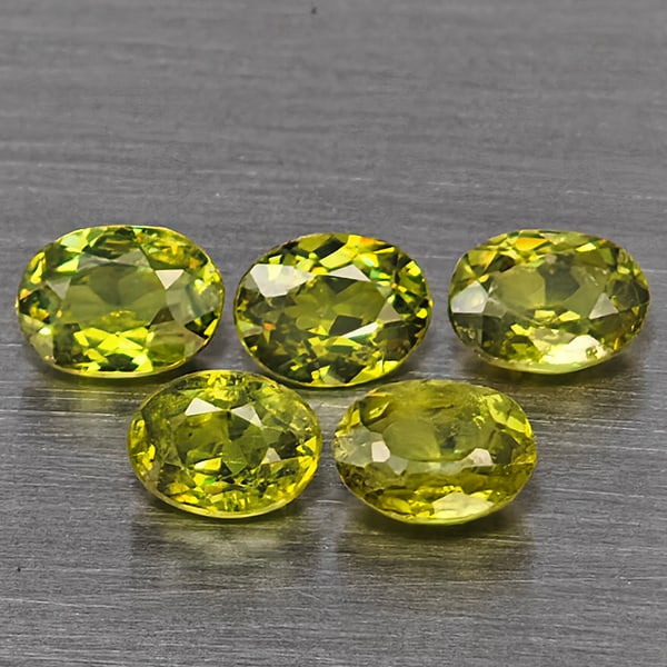 Natural Green Demantiod Garnet 1.18 Ct. 5 Pcs Oval Shape 4.5 x 3.3 Mm Gemstones From Madagascar: Product ID: 802937528 Product Name: Natural Demantoid Weight: 1.18 CT. Size: 4.5 x 3.3 x 2.1 MM. Shape: Oval Color: Green Clarity:SI1 Luster: Good Gems Origin: Madagascar Treatment: Unheated Crystal S