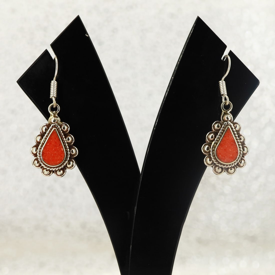 Tibetan Red Coral Handmade Boho Earring: Product ID: 250822145016 Product - Tibetan Handmade Earring Gemstone - Natural Coral Size - 2 Cm Weight - 6 Gram Metal - Brass & Copper mix Metal Origin - Nepal Country/Region of Manufacture - Nepal A