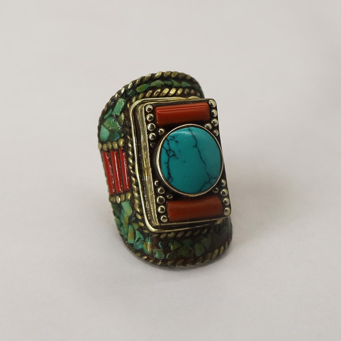 Turquoise & Coral Handmade Vintage Old Ring - 7 MM: Product ID: 250814154639 Product - Tibetan Handmade Ring Gemstone - Natural Turquoise & Coral Size - 7 MM Weight - 26 Gram Metal - Brass & Copper mix Metal Origin - Nepal Country/Region of Manufacture