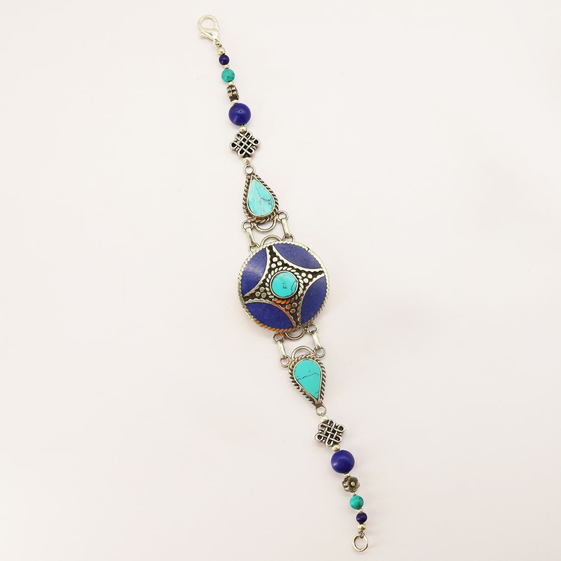 Vintage Tibetan Nepalese Handmade Ethnic Bracelet: Product ID: 250810174959 Product - Tibetan Handmade Bracelet Gemstone - Natural Turquoise & Lapis Size - 7 Inch Weight - 35 Gram Approx Metal - Brass & Copper mix Metal Origin - Nepal Country/Region o