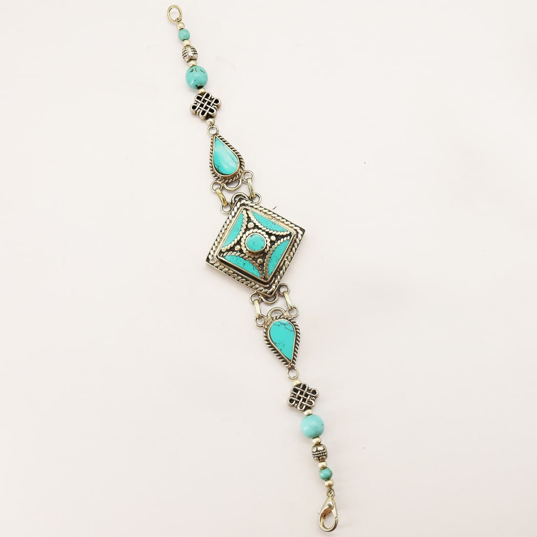 Tibetan Turquoise Handmade Ethnic Bracelet: Product ID: 250810175112 Product - Tibetan Handmade Bracelet Gemstone - Natural Turquoise Size - 7 Inch Weight - 30 Gram Approx Metal - Brass & Copper mix Metal Origin - Nepal Country/Region of Manufa