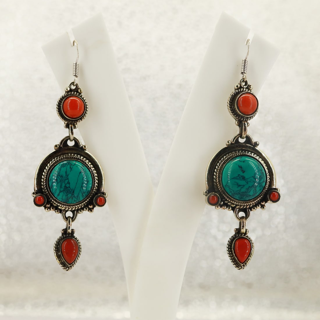 Tibetan Turquoise & Coral Handmade Boho Fine Earring: Product ID: 250823142638 Product - Tibetan Handmade Earring Gemstone - Natural Turquoise & Coral Size - 3x2x1 Cm Weight - 25 Gram Metal - Brass & Copper mix Metal Origin - Nepal Country/Region of Manu
