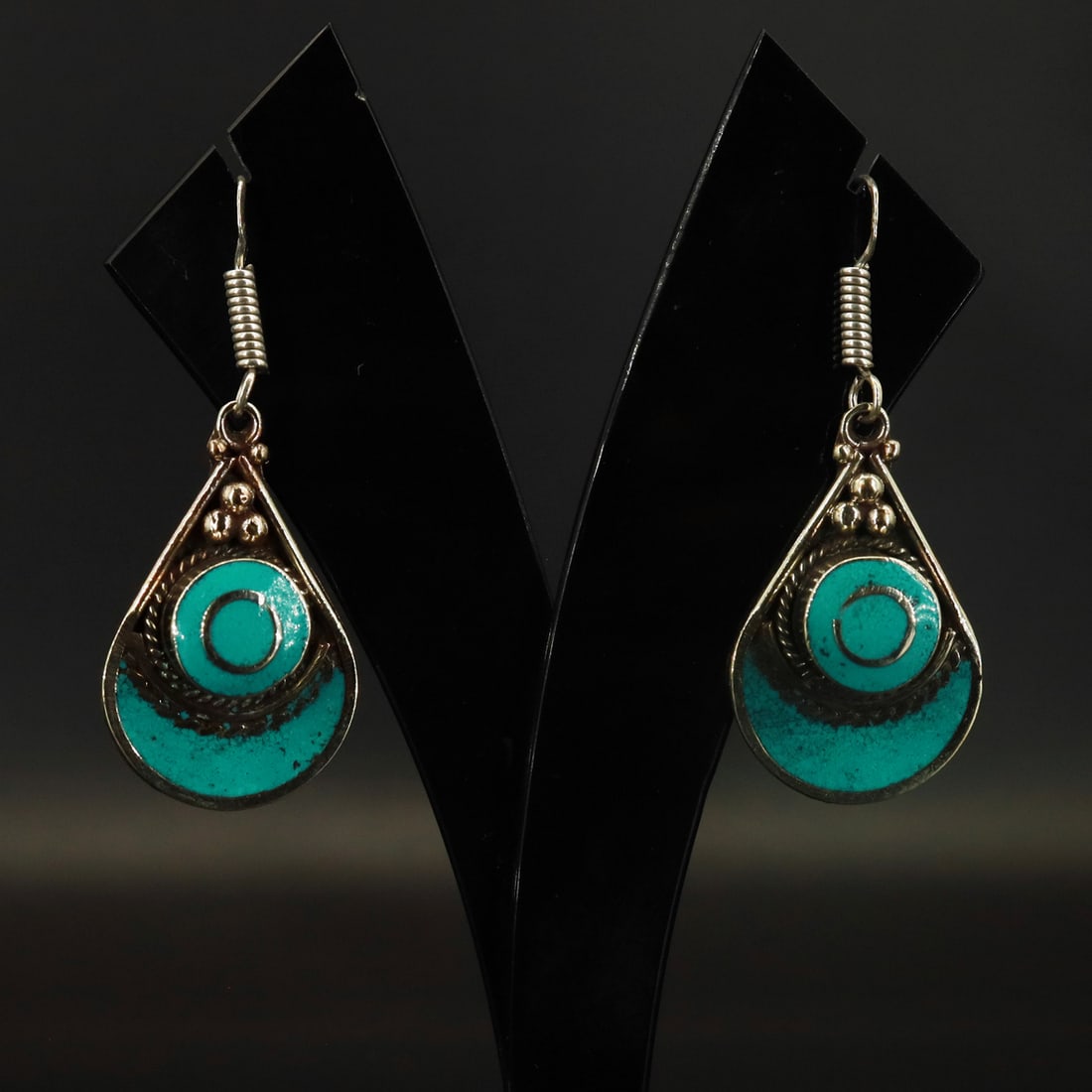 Tibetan Turquoise Handmade Asian Earring: Product ID: 251001160128 Product - Tibetan Handmade Earring Gemstone - Tibetan Turquoise Size - 3.5x5 Cm Weight - 23 Gram Metal - Brass & Copper mix Metal Origin - Nepal Country/Region of Manufacture