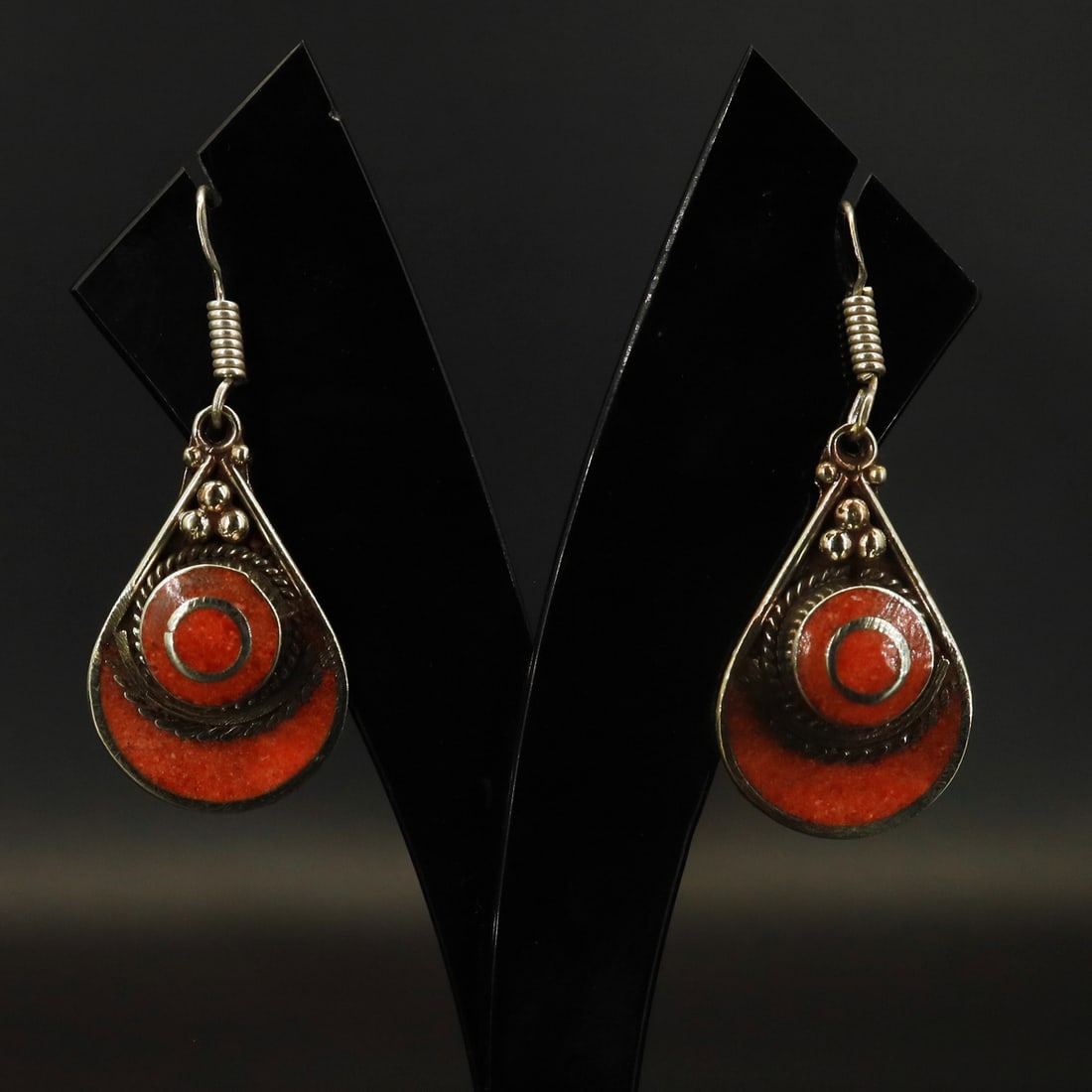 Tibetan Red Coral Handmade Boho Hippie Earring: Product ID: 251001161708 Product - Tibetan Handmade Earring Gemstone - Tibetan Red Coral Size - 3x2 Cm Weight - 22 Gram Metal - Brass & Copper mix Metal Origin - Nepal Country/Region of Manufacture - 