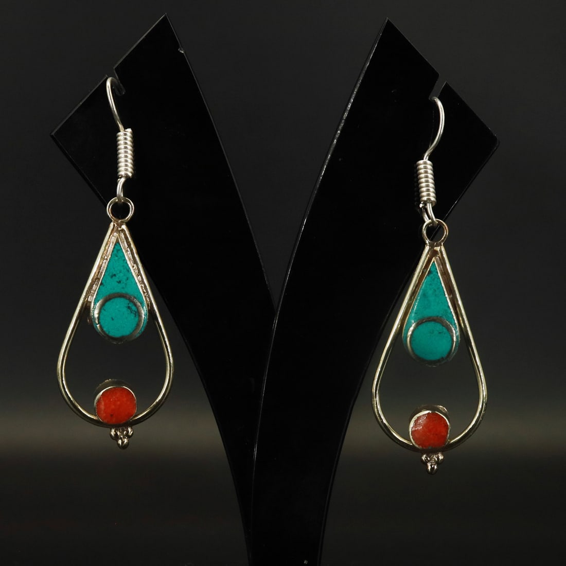 Tibetan Natural Turquoise & Coral Handmade Earring: Product ID: 251001161330 Product - Natural Handmade Earring Gemstone - Tibetan Natural Turquoise & Coral Size - 4x2 Cm Weight - 22 Gram Metal - Brass & Copper mix Metal Origin - Nepal Country/Region o