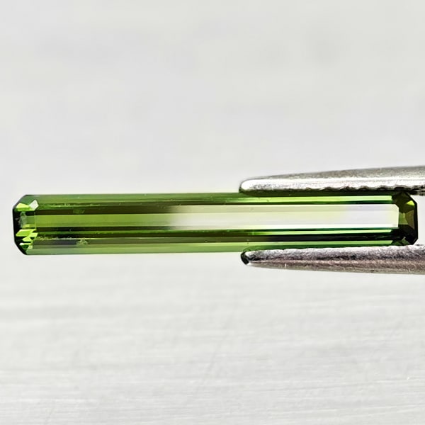 Natural Green Tourmaline 1.05 Ct. Octagon Shape 18.9 x 2.8 Mm Gemstone From Nigeria: Product ID: 807247244 Product Name: Natural Tourmaline Weight: 1.05 CT. Size: 18.9 x 2.8 x 2 MM. Shape: Octagon Color: Green Clarity:VVS Luster: Good Gems Origin: Nigeria Treatment: Unheated Crystal S