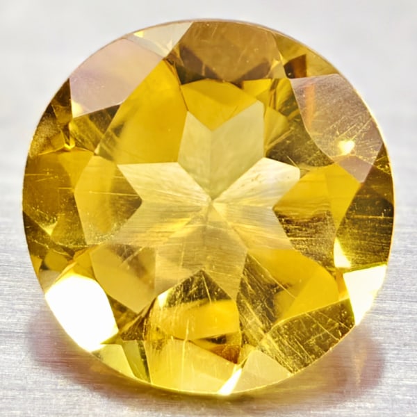 Natural Yellow Citrine 1.18 Ct. VVS Round Shape 7 Mm. Unheated Gemstone: Product ID: 801813572 Product Name: Natural Citrine Weight: 1.18 CT. Size: 7 x 7 x 4.3 MM. Shape: Round Color: yellow Clarity:VVS Luster: Good Gems Origin: Barzil Treatment: Unheated Crystal Structure