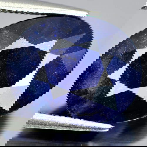 Natural Deep Blue Sapphire 10.97 Ct. Oval Shape 14.3 x 11.7 Mm Gemstone from Madagascar: Product ID: 806010772 Product Name: Natural Blue Sapphire Weight: 10.97 CT. Size: 14.3 x 11.7 x 7.3 MM. Shape: Oval Color: Deep Blue Clarity:SI1 Luster: Good Gems Origin: Madagascar Treatment: Heated