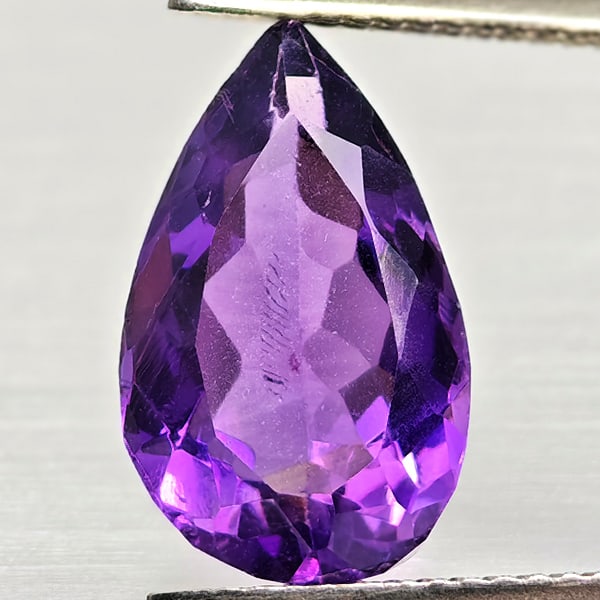 Natural Purple Amethyst 5.17 Ct. Pear Shape 14.9 x 9.2 Mm Gemstone From Brazil: Product ID: 800325426 Product Name: Natural Amethyst Weight: 5.17 CT. Size: 14.9 x 9.2 x 6.6 MM. Shape: Pear Shape Color: Purple Clarity:VSI Luster: Good Gems Origin: Brazil Treatment: Unheated Crysta