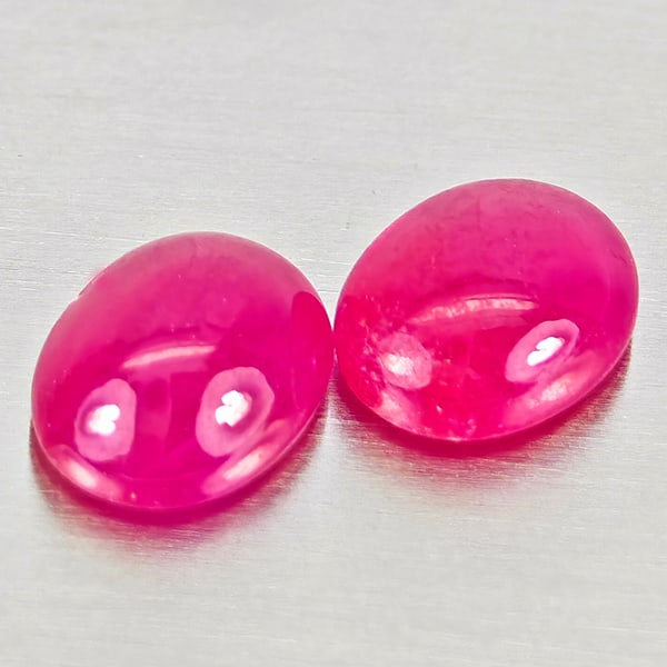 Natural Pink Red Jonson Ruby 1.29 Ct. 2 Pcs Oval Cabochon Shape 5.8 x 4.2 Mm Gemstones from: Product ID: 805935704 Product Name: Natural Ruby Weight: 1.29 CT. Size: 5.8 x 4.2 x 2.8 MM. Shape: Oval Cabochon Color: Pink Red Clarity:Semi - Transparent Luster: Good Gems Origin: Mozambique Treatme